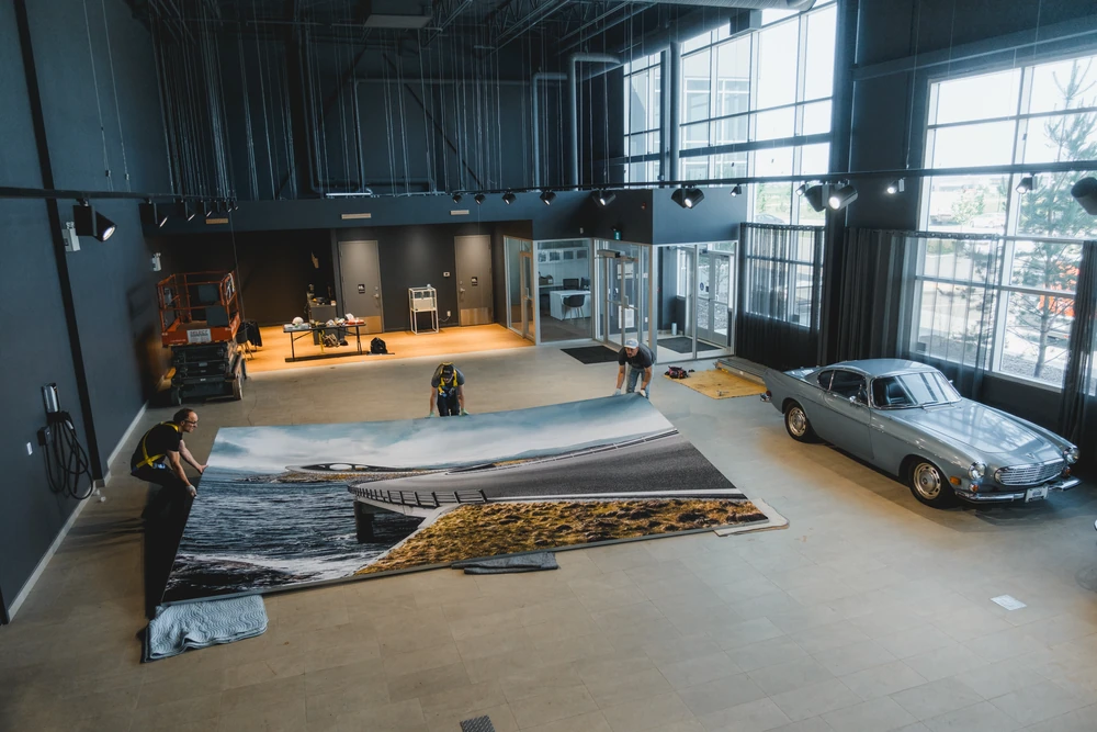 A large photographic artwork installed within an interior.