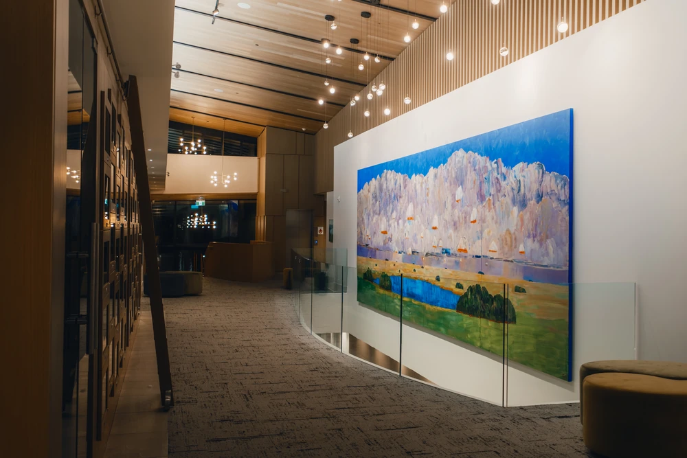 A completed artwork installation shown within the surrounding architecture.