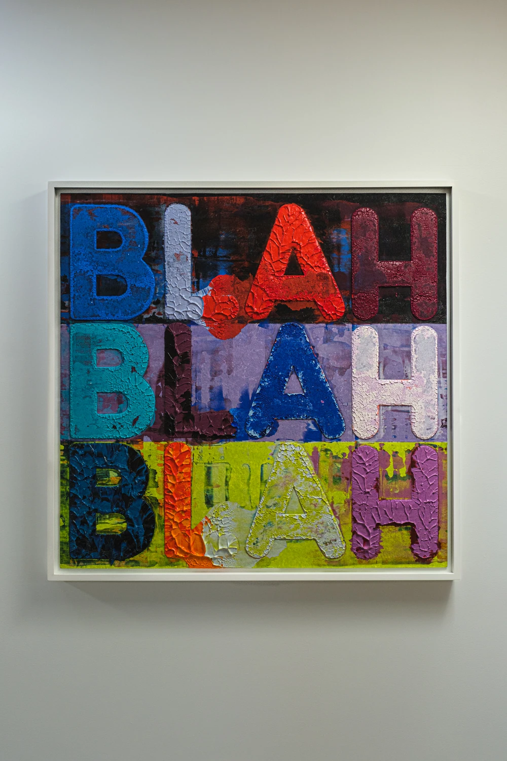 An original artwork by Mel Bochner displayed on a wall