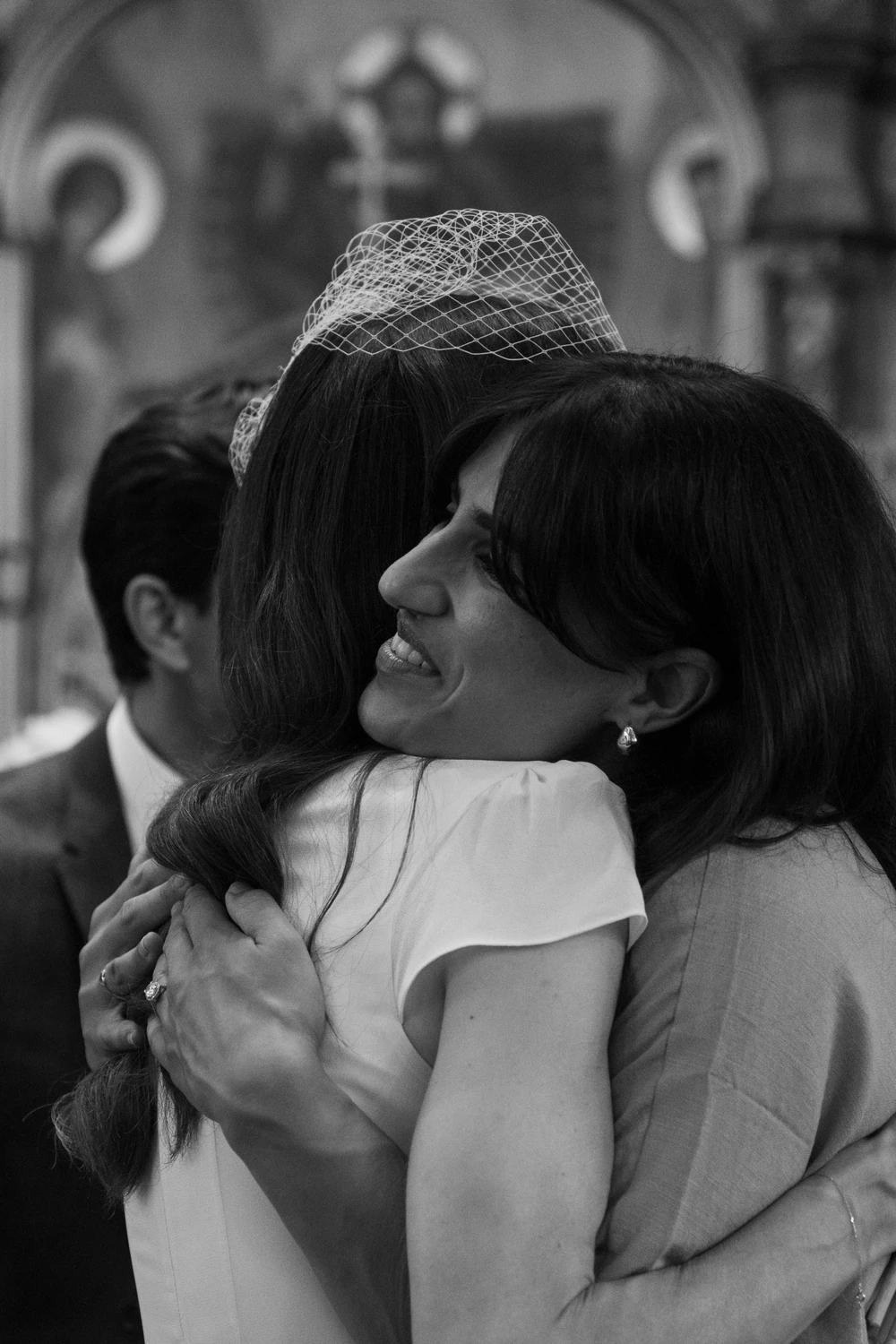 An emotional embrace during the wedding celebration.